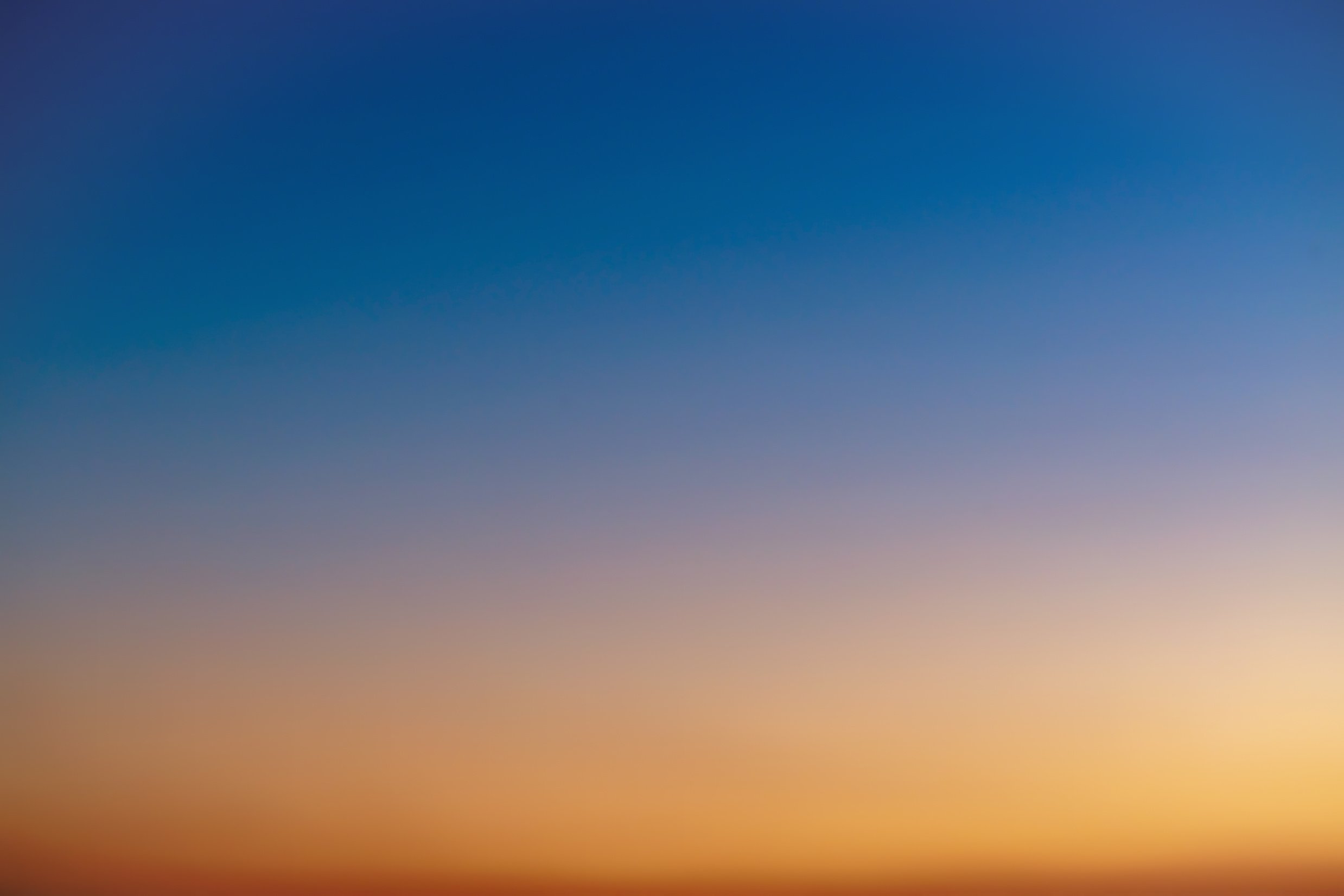 Orange horizon and blue atmosphere. Smooth orange blue gradient